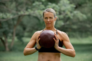 Photo of woman strength training in the park
