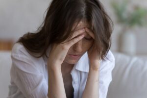 Photo of woman looking tired with low energy